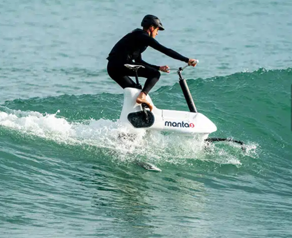 Manta5 hydro bike foiling above Maui ocean water