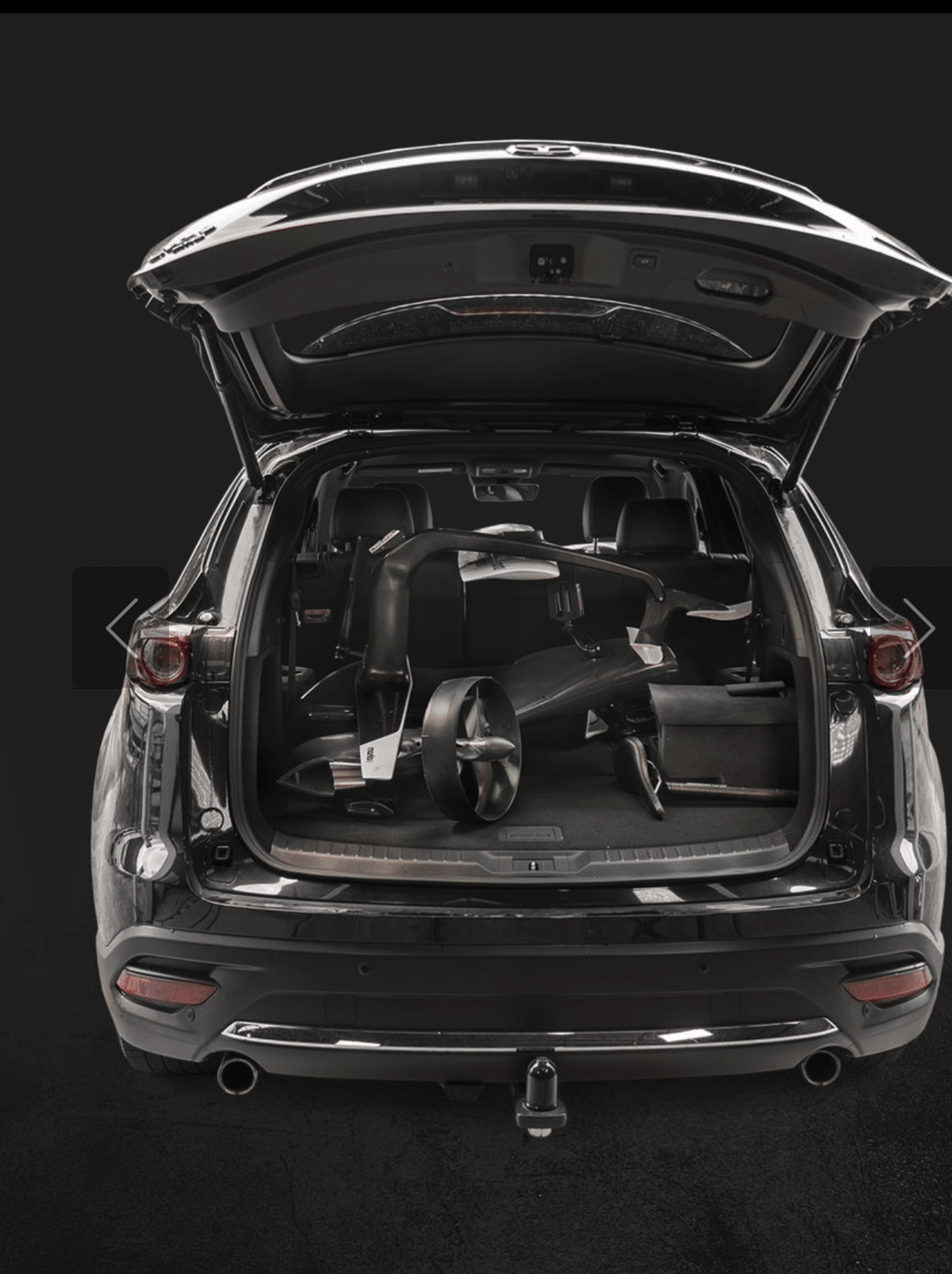 Manta5 hydro bike packed into an SUV for transport